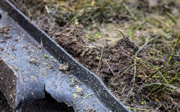 U.S. Marine Corps explosive ordnance disposal technicians engage with international media in Latvia