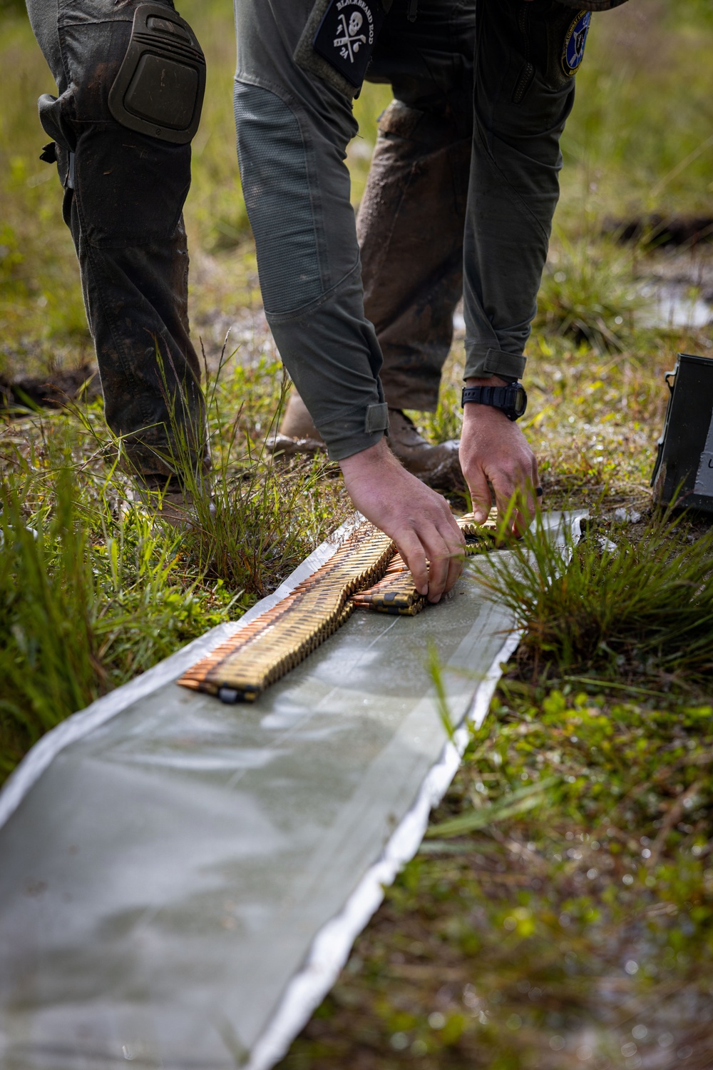 U.S. Marine Corps explosive ordnance disposal technicians engage with international media in Latvia