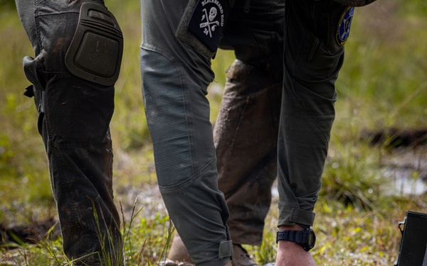 U.S. Marine Corps explosive ordnance disposal technicians engage with international media in Latvia