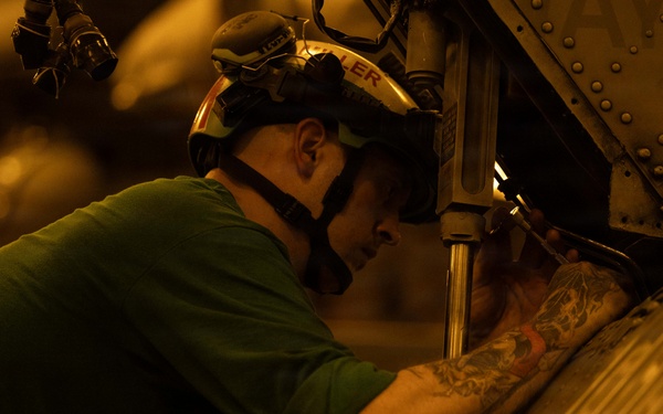 USS George H.W. Bush Sailors Perform Aircraft Maintenance