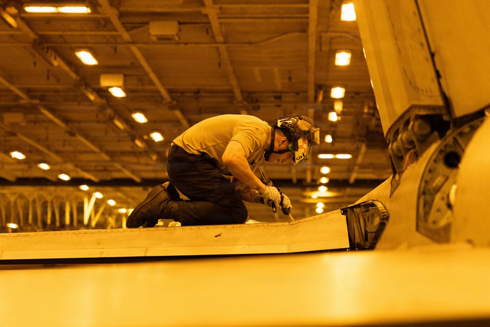 USS George H.W. Bush Sailors Perform Aircraft Maintenance