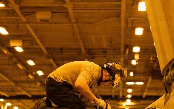 USS George H.W. Bush Sailors Perform Aircraft Maintenance