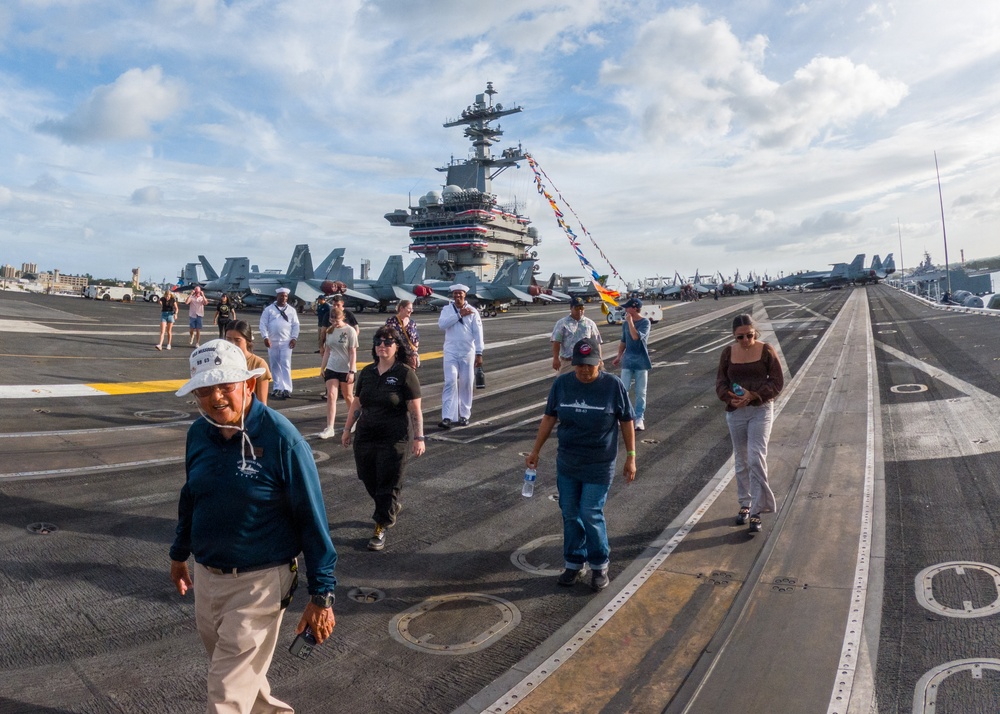 USS Missouri docents tour Theodore Roosevelt during RIMPAC 26