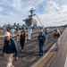 USS Missouri docents tour Theodore Roosevelt during RIMPAC 26