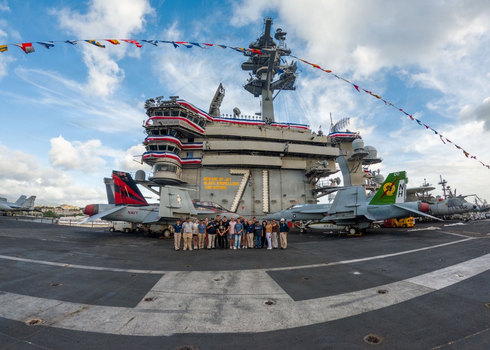 USS Missouri docents tour Theodore Roosevelt during RIMPAC 26