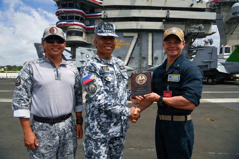 Philippine Coast Guard tours USS Theodore Roosevelt during RIMPAC