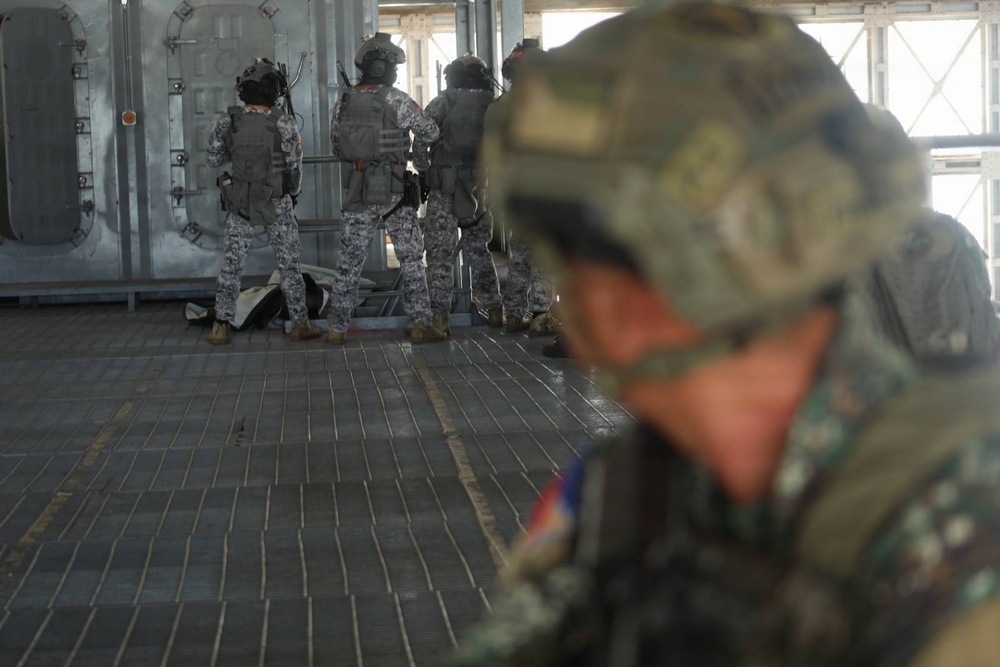 Philippine service members demonstrate joint vessel boarding during RIMPAC 2026