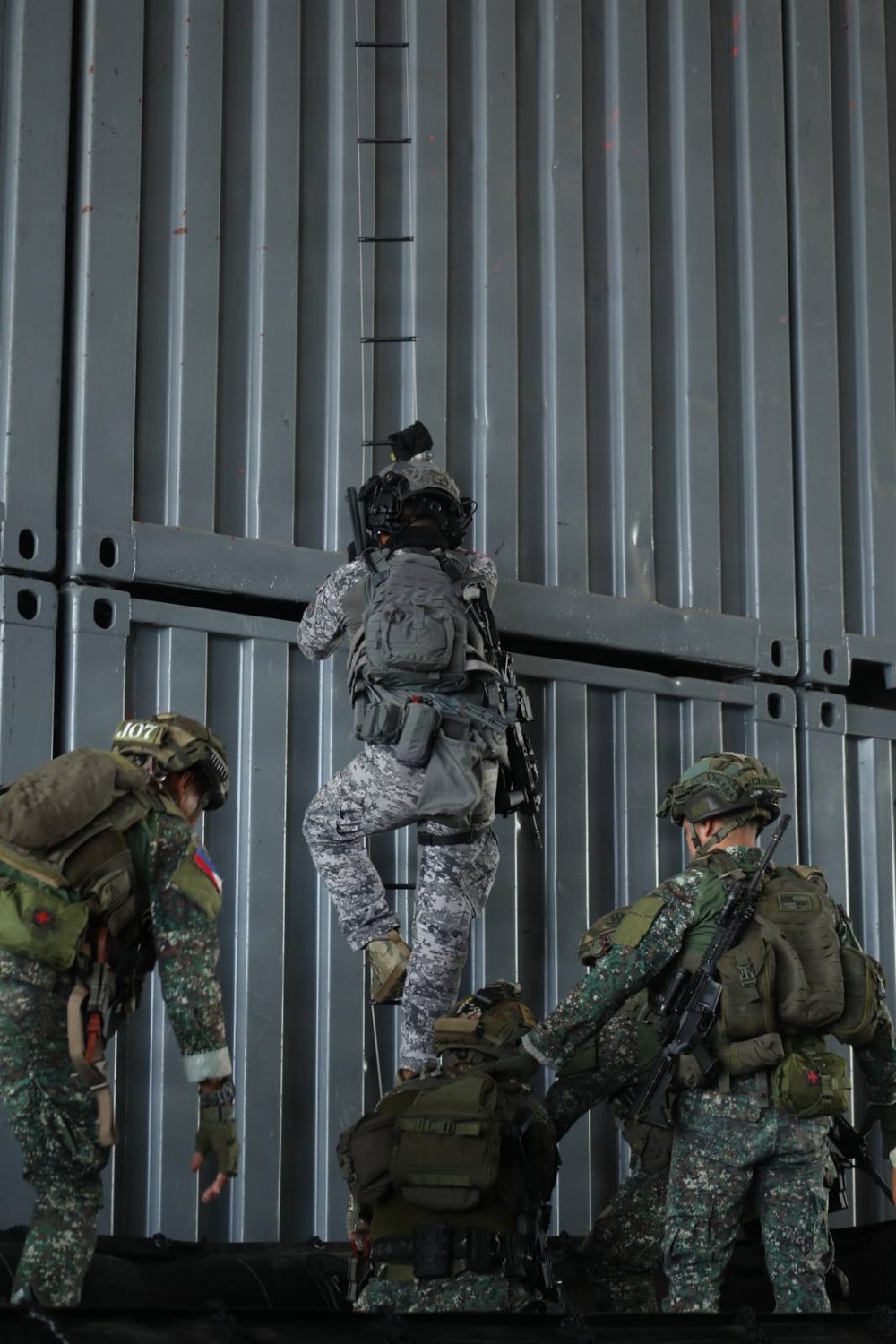 Philippine service members demonstrate joint vessel boarding during RIMPAC 2026