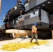 Navy, Marine Corps teams expand maritime positioning capability during USNS Button backload