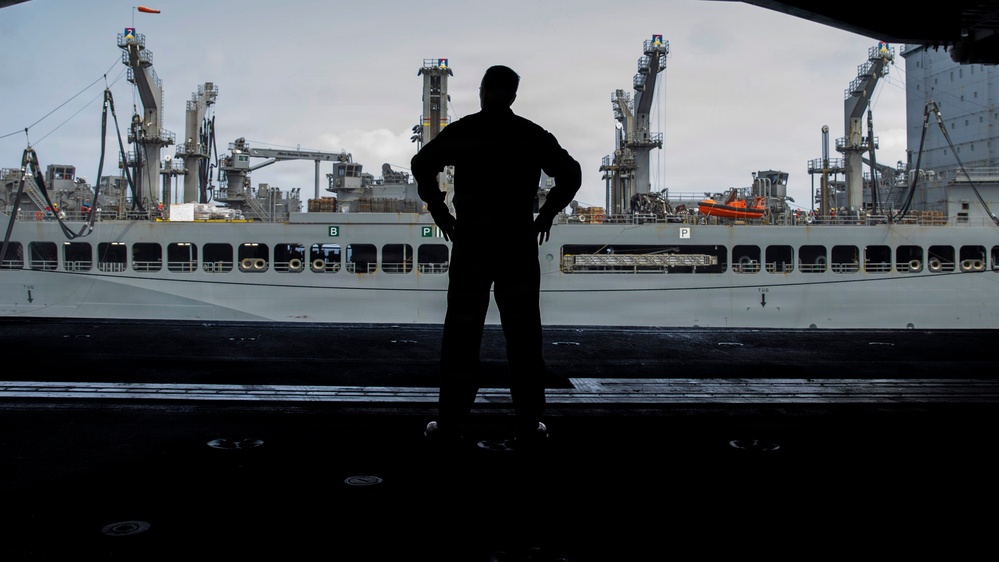 Abraham Lincoln Conducts a Fueling-at-Sea with USNS John Lewis