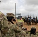 Reserve Officers' Training Corps (JROTC) watch 1st Cavalry Division Horse Cavalry Detachment demonstration