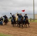 Reserve Officers' Training Corps (JROTC) watch 1st Cavalry Division Horse Cavalry Detachment demonstration