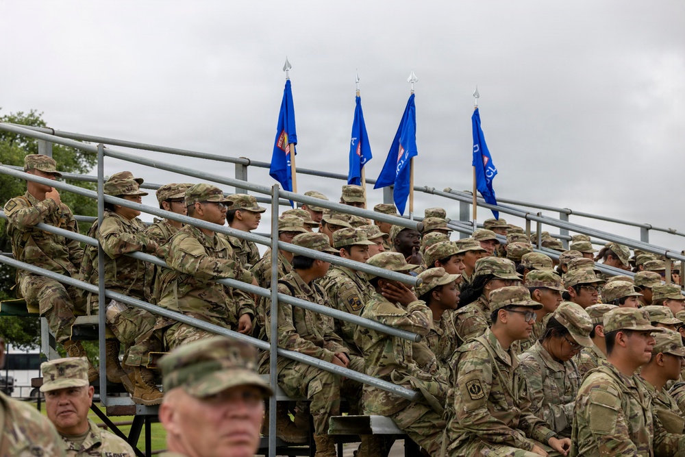 Reserve Officers' Training Corps (JROTC) watch 1st Cavalry Division Horse Cavalry Detachment demonstration
