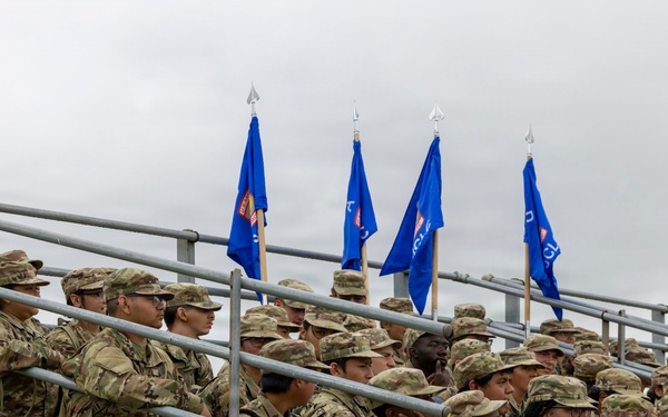 Reserve Officers' Training Corps (JROTC) watch 1st Cavalry Division Horse Cavalry Detachment demonstration