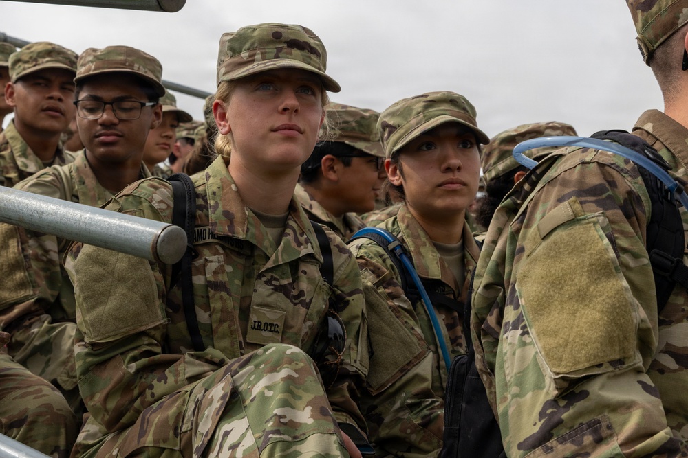 Reserve Officers' Training Corps (JROTC) watch 1st Cavalry Division Horse Cavalry Detachment demonstration