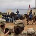 Reserve Officers' Training Corps (JROTC) watch 1st Cavalry Division Horse Cavalry Detachment demonstration