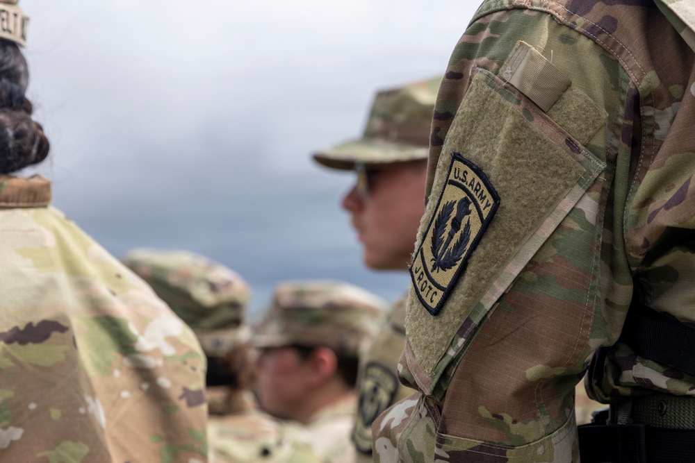 Reserve Officers' Training Corps (JROTC) watch 1st Cavalry Division Horse Cavalry Detachment demonstration