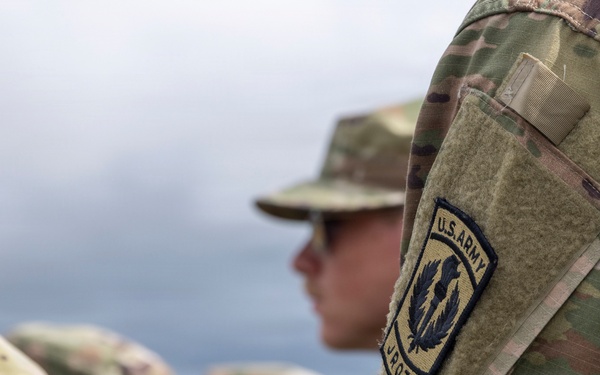 Reserve Officers' Training Corps (JROTC) watch 1st Cavalry Division Horse Cavalry Detachment demonstration