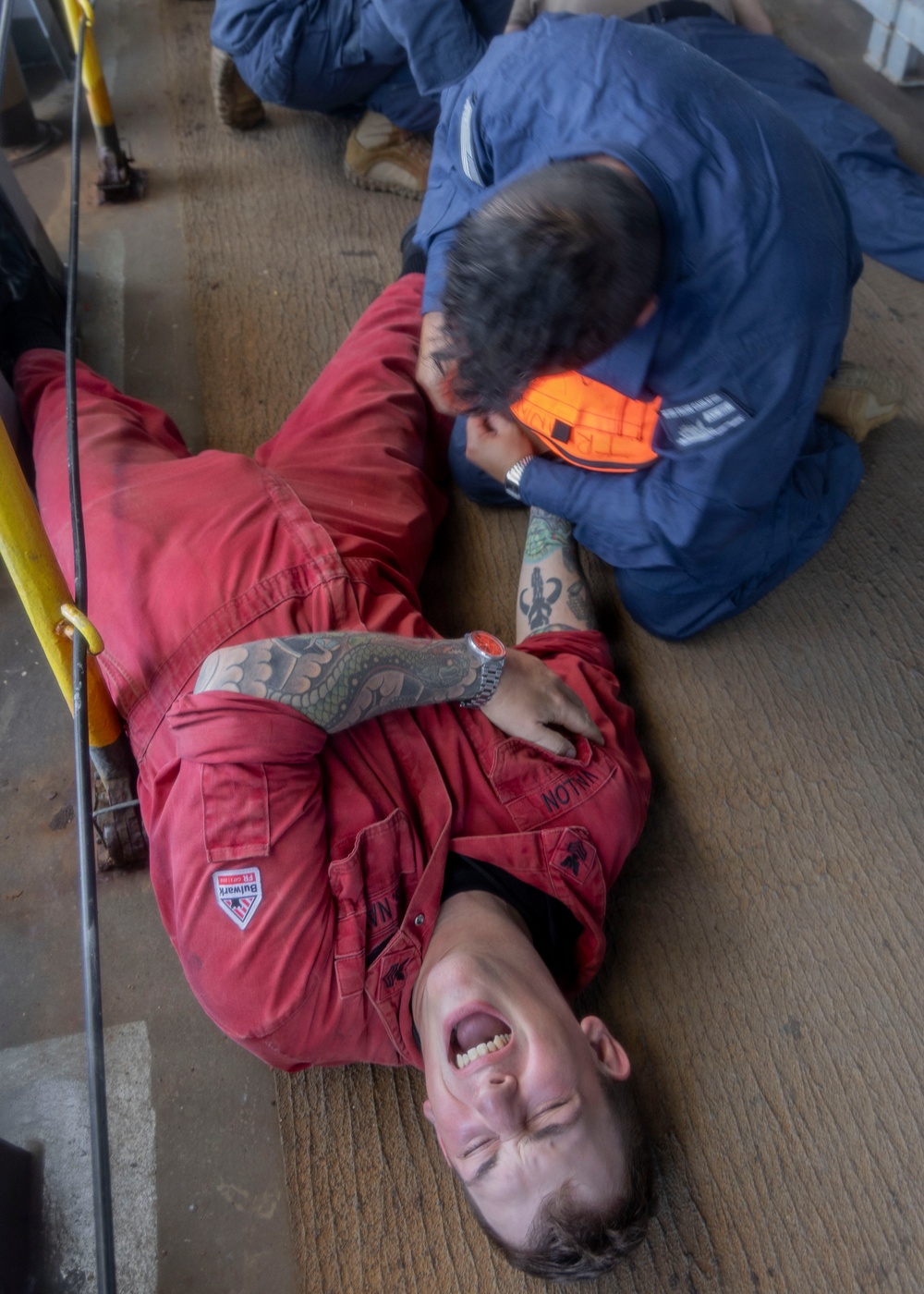 USS Frank Cable conducts a mass casualty drill