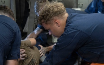 USS Frank Cable conducts a mass casualty drill