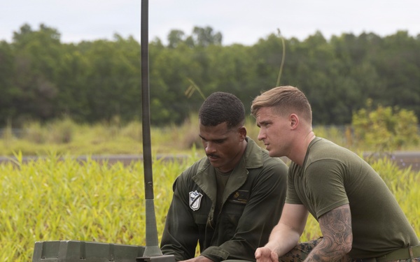 Slingshot: VMFA-214 sets up PRC-160(V) radio