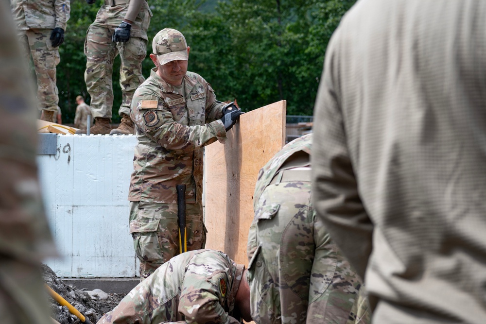 169th CES Airmen construct pole barn during Alaska DFT