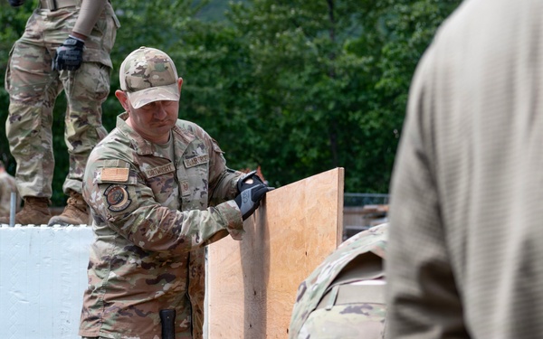 169th CES Airmen construct pole barn during Alaska DFT