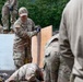 169th CES Airmen construct pole barn during Alaska DFT