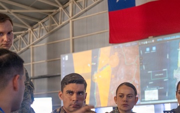 Exercise Resolute Sentinel - Salitre 2026 participants work together in the Combined Air Operations Center