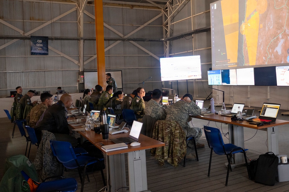 Exercise Resolute Sentinel - Salitre 2026 participants work together in the Combined Air Operations Center
