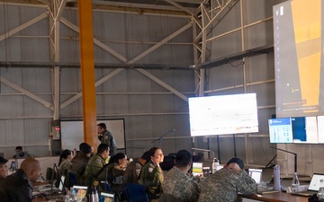 Exercise Resolute Sentinel - Salitre 2026 participants work together in the Combined Air Operations Center