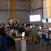 Exercise Resolute Sentinel - Salitre 2026 participants work together in the Combined Air Operations Center