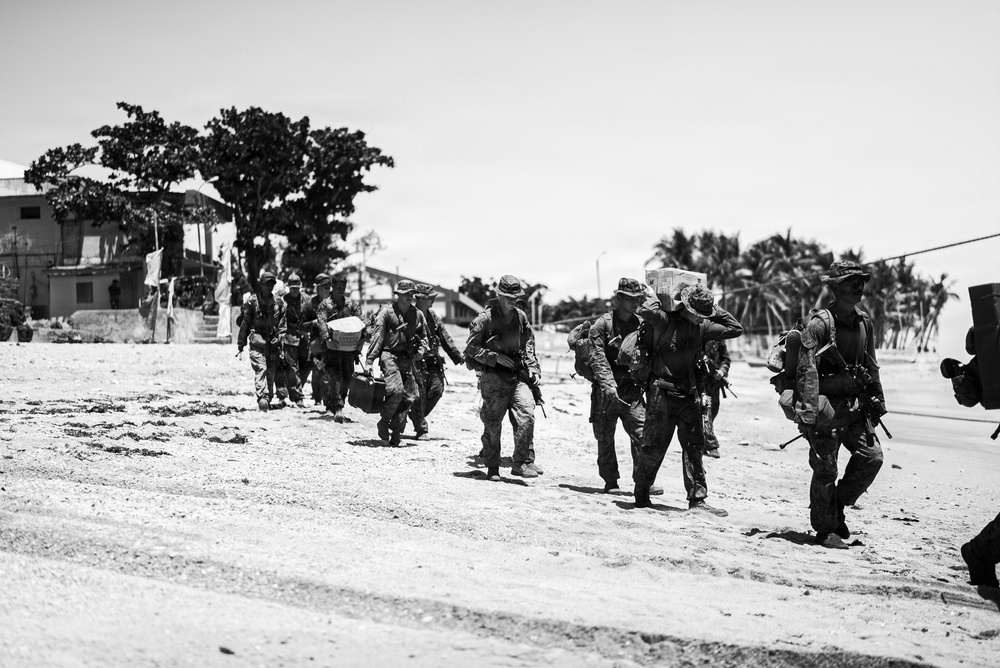 3rd Marine Littoral Regiment loads Philippine surface connectors after maritime key terrain security operations during KAMANDAG 10