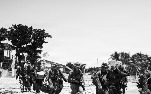 3rd Marine Littoral Regiment loads Philippine surface connectors after maritime key terrain security operations during KAMANDAG 10