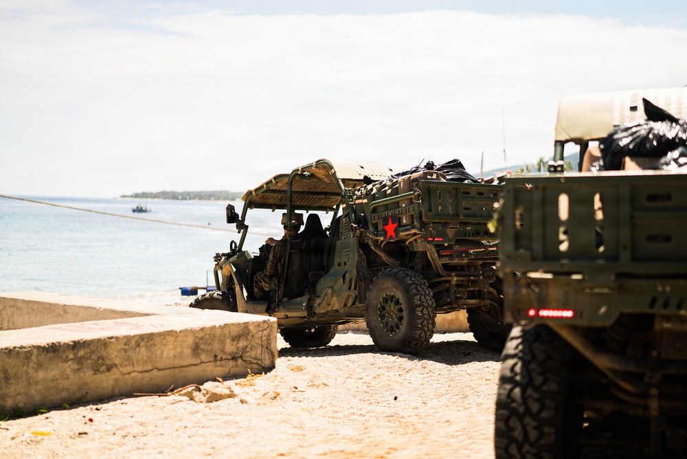 3rd Marine Littoral Regiment loads Philippine surface connectors after maritime key terrain security operations during KAMANDAG 10