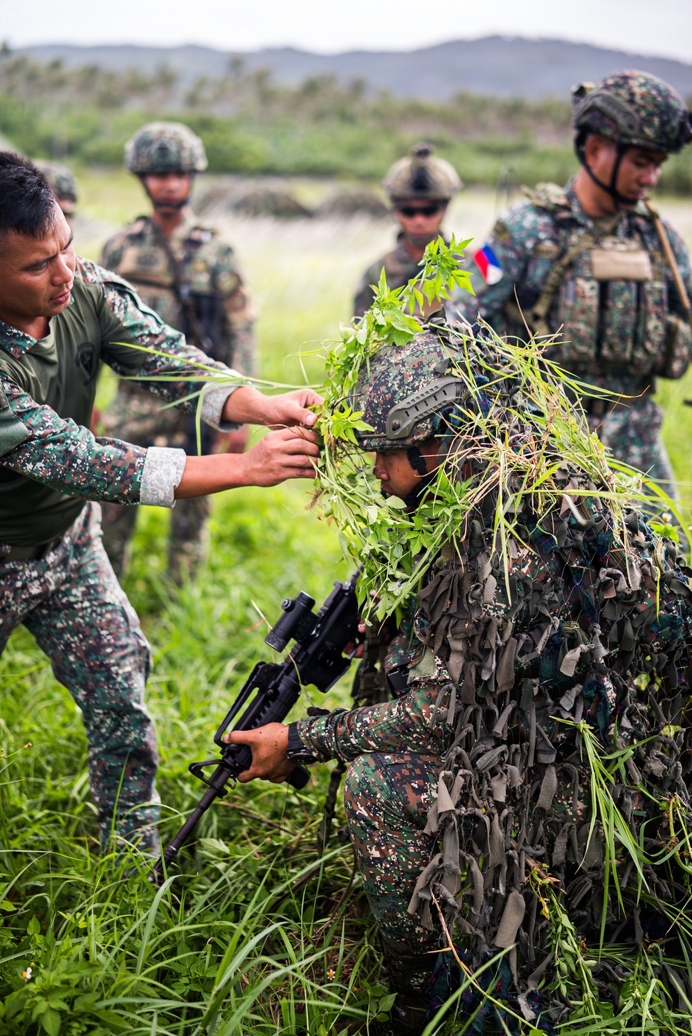 3rd Littoral Combat Team, Philippine marines conduct cover and concealment training during KAMANDAG 10