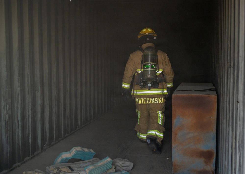 Fire protection specialists conduct controlled burn training event