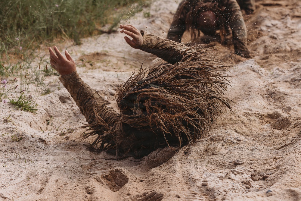 1-112th Infantry Recon squads conduct ‘ghillie wash’ training event