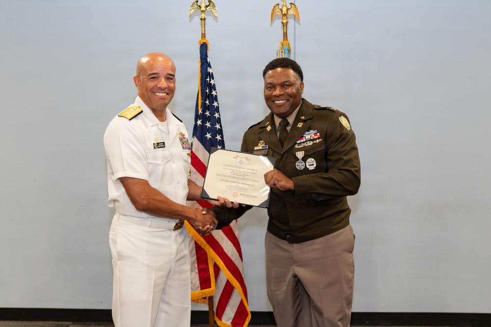 U.S. Navy Admiral Presents Defense Superior Service Medal to Army Colonel