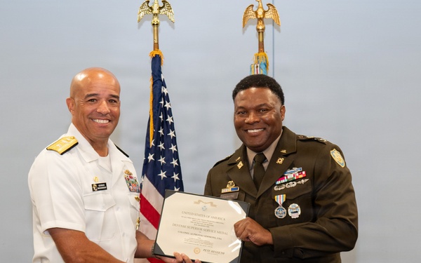 U.S. Navy Admiral Presents Defense Superior Service Medal to Army Colonel