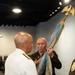 Military Officers Conduct Colors Transfer During Change of Command Ceremony