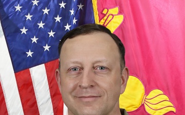 Colonel Carlos Wandembergh, Blue Grass Army Depot Commander in his Army Combat Uniform (ACU) displaying the BGAD unit colors.