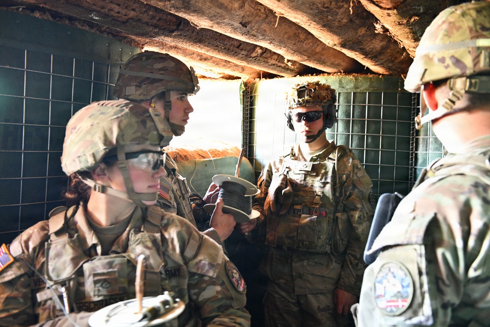 107th Engineer Battalion Soldiers of the Michigan Army National Guard and Latvian Zemessardzes build defensive training areas with NATO partners.