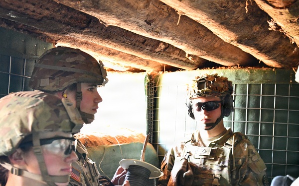 107th Engineer Battalion Soldiers of the Michigan Army National Guard and Latvian Zemessardzes build defensive training areas with NATO partners.
