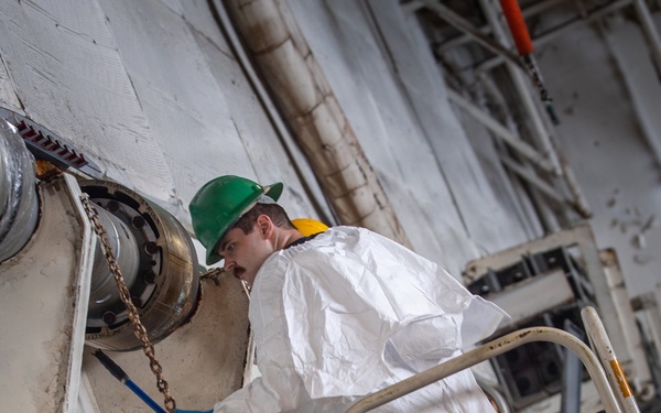 USS Nimitz Sailors Paint the Hangar bay
