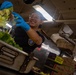 USS Nimitz Sailor Chops Lettuce