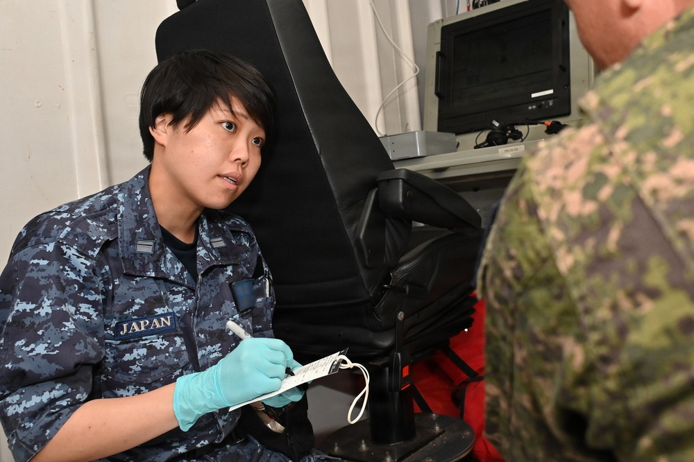 JMSDF Medical Personnel Conduct TCCC Training Aboard Canadian ship