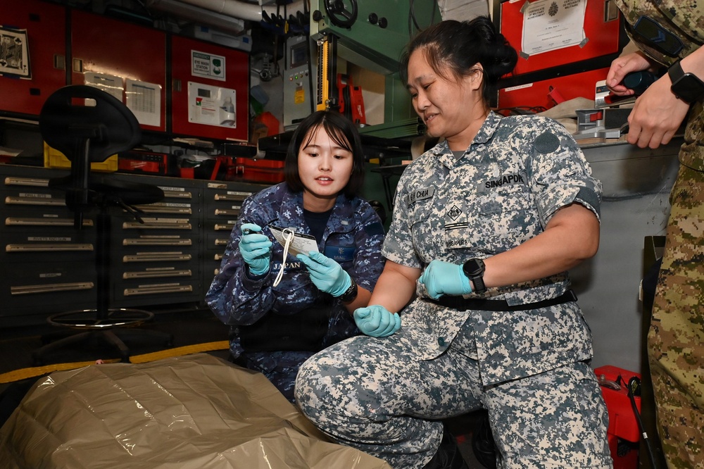 JMSDF Medical Personnel Conduct TCCC Training Aboard Canadian ship