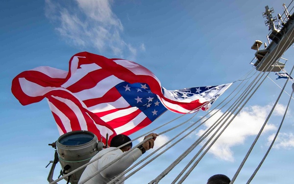 Battle Ensign Raised on USS George Washington Mast