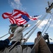 Battle Ensign Raised on USS George Washington Mast